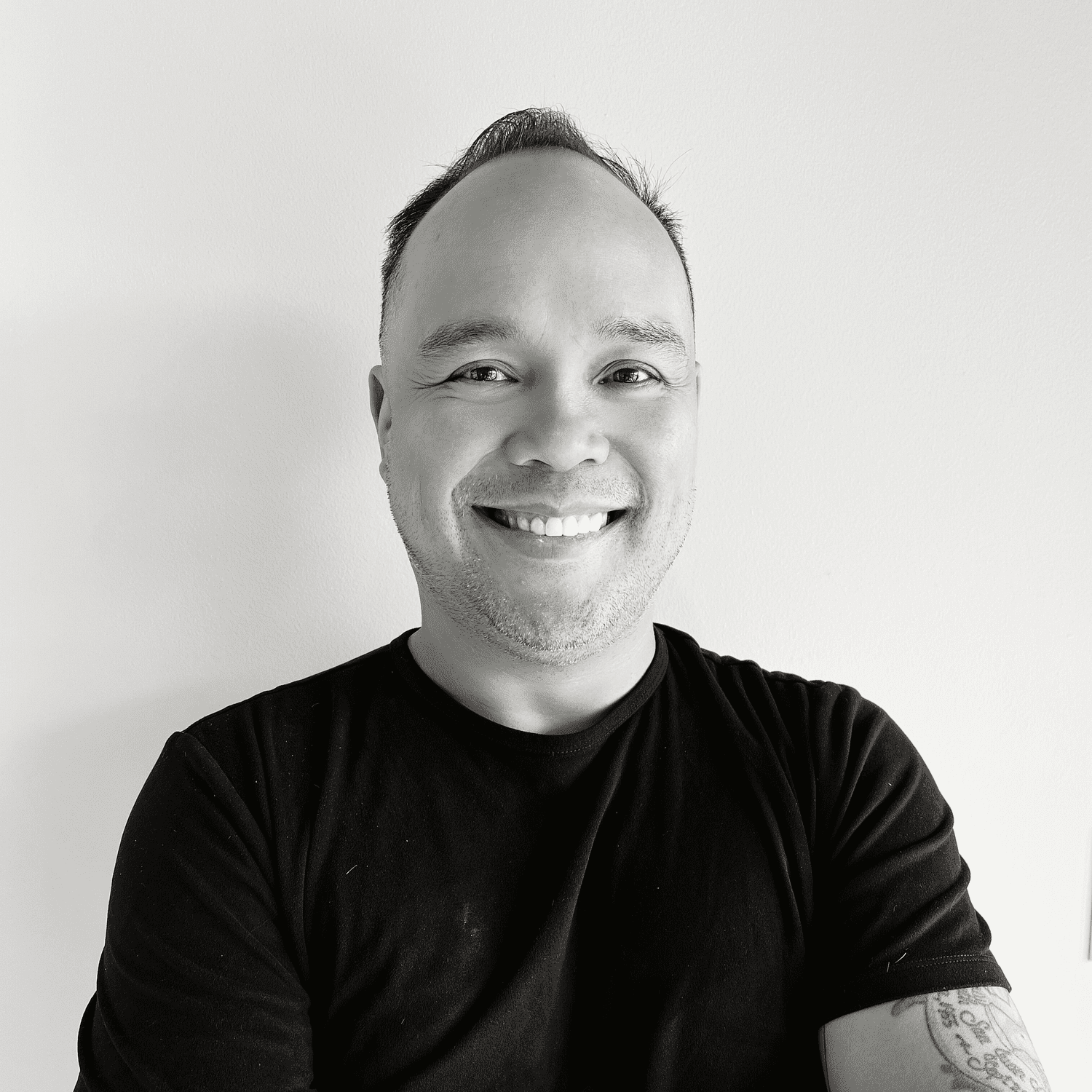 Portrait of Jeff, a professional stylist at Lux Salon, showcasing their expertise and style.